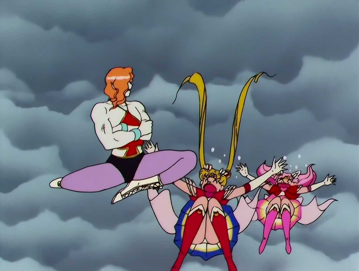 Tobihaneru has now lost the jacket, exposing the full glory of his weird red spade shirt thing, and he’s trampolining with a reluctant Sailor Moon and Chibi Moon.